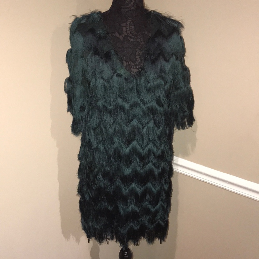 Green dress with tassel detail